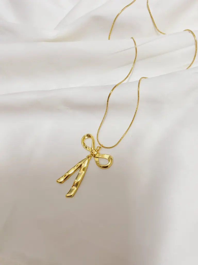 STAINLESS STEEL GOLD BOW-SHAPED PENDANT
